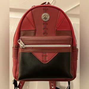 The Infinity Saga - red and black small book bag.